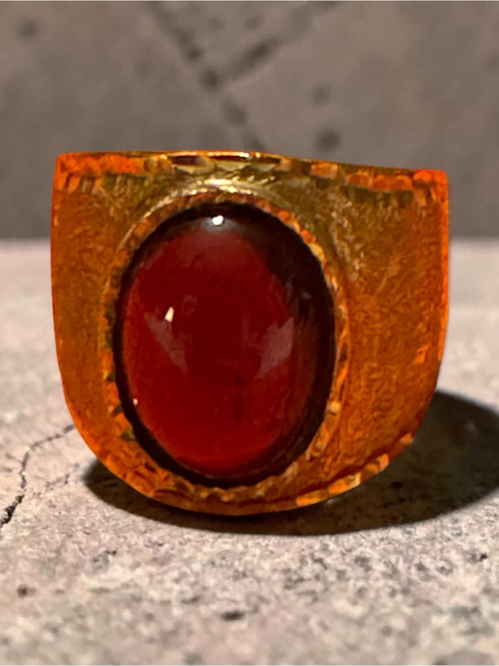 Bold Gold-Tone Ring with Deep Red Cabochon